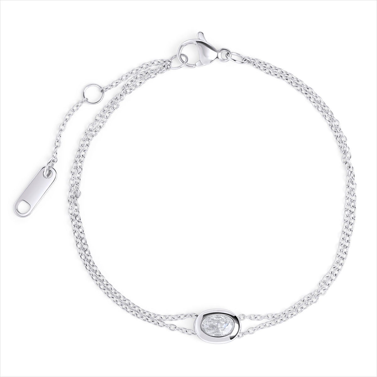 A double silver chain bracelet with an oval clear stone centerpiece, shown on a clean white background. Waterproof, stainless steel and allergy free. By Mia Bijoux Canada.
Bracelet à double chaîne argentée orné d'une pierre transparente ovale en son centre, présenté sur fond blanc épuré. Résistant à l'eau, en acier inoxydable et hypoallergénique. Par Mia Bijoux Canada.