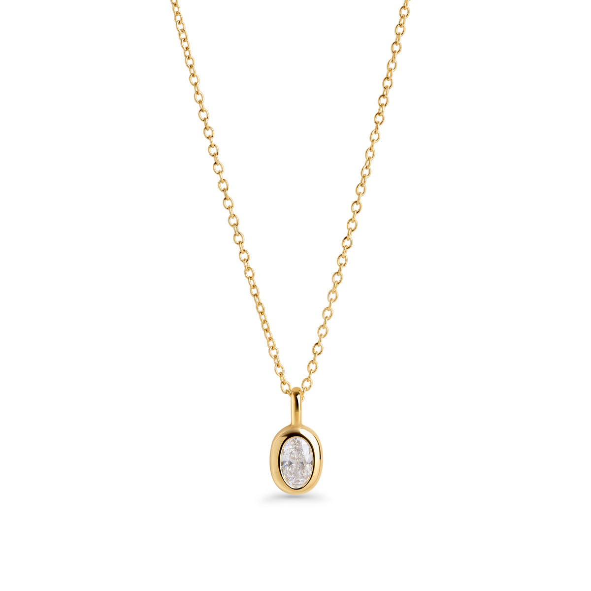 A gold chain necklace with a small oval clear stone pendant, shown on a clean white background. Waterproof, stainless steel and allergy free. By MIAJWL.
Collier à chaîne dorée avec petit pendentif serti d'une pierre transparente ovale, présenté sur fond blanc épuré. Résistant à l'eau, en acier inoxydable et hypoallergénique. Par MIAJWL.