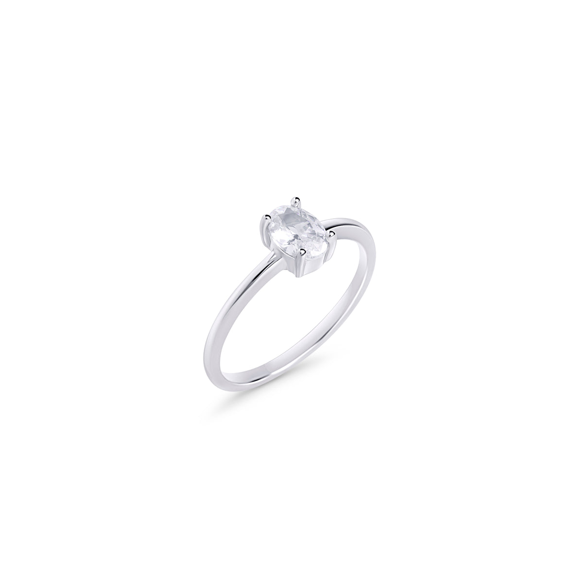 Delicate silver ring set with a single oval clear stone on a white background. Nickel-free, waterproof & tarnish-resistant stainless steel ring for sensitive skin, minimalist luxury jewelry by Mia Bijoux Canada.

Bague délicate argentée sertie d'une seule pierre transparente ovale sur fond blanc. Bague en acier inoxydable sans nickel, résistante à l'eau et anti-ternissement pour peaux sensibles, bijouterie de luxe minimaliste par Mia Bijoux Canada.
