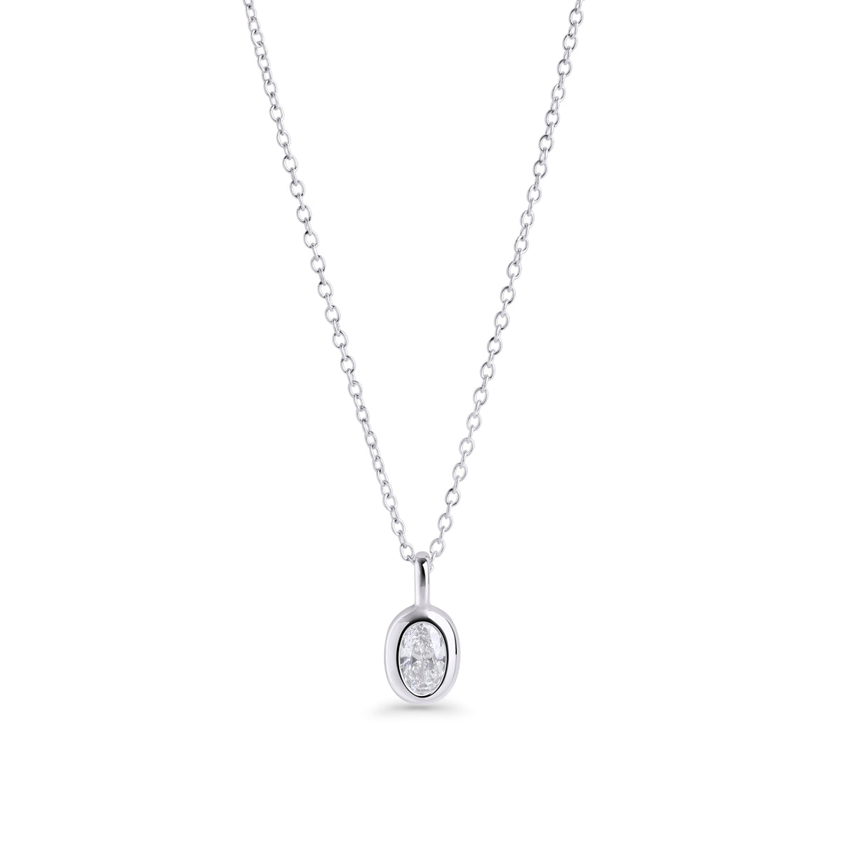 A silver chain necklace with a small oval clear stone pendant, shown on a clean white background. Waterproof, stainless steel and allergy free. By MIAJWL.

Collier à chaîne argentée avec petit pendentif serti d'une pierre transparente ovale, présenté sur fond blanc épuré. Résistant à l'eau, en acier inoxydable et hypoallergénique. Par MIAJWL.